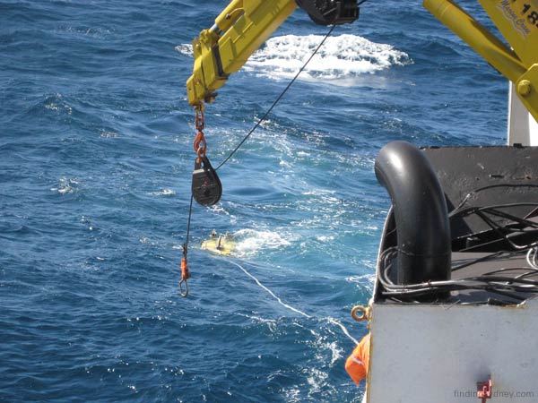 The sonar towfish streaming behind the ship.